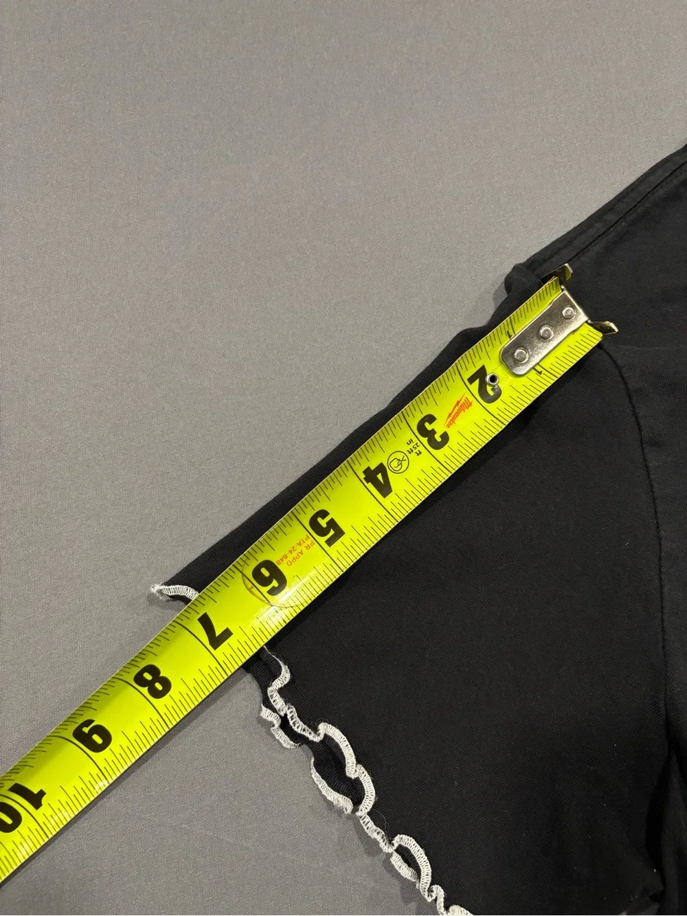 Nike Black Cropped Tee with White Swoosh and Lettuce Hem